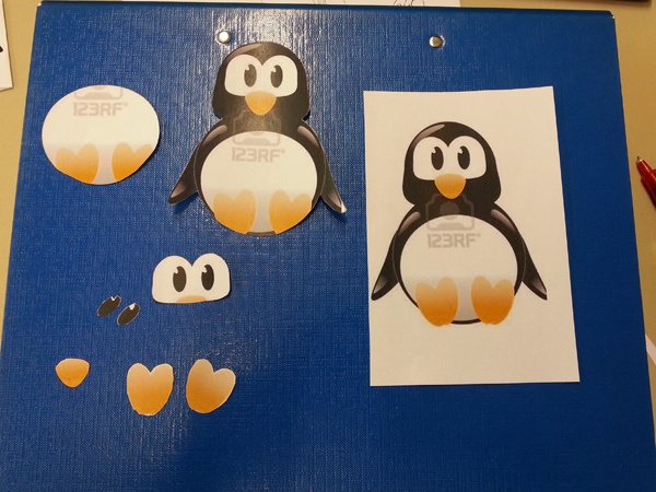 Аппликации в виде пингвинят на локти свитера