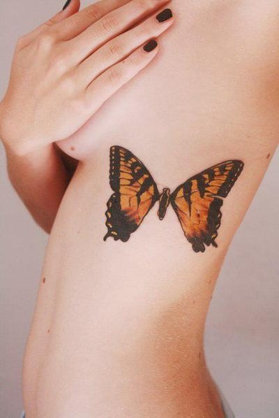 татуировка большая бабочка