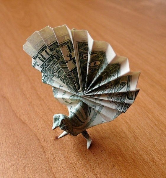 Оригами из денег от Craig Sonnenfeld