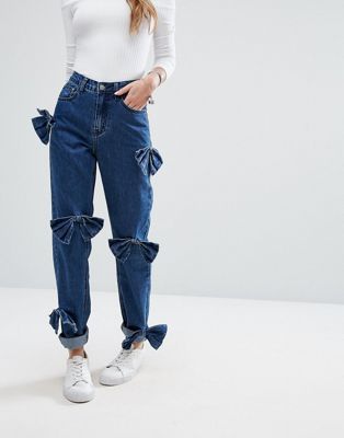 джинсы с бантами